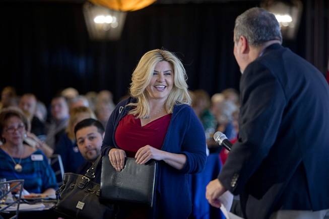 During her run last year for Congressional District 3, Michele Fiore comes up to the stage during an April 26 town hall meeting sponsored by the Southern Hills Republican Women's Club at Buckman's Grille in Henderson.