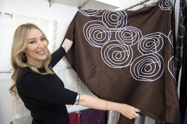 Mona Steck, owner of Settings by Mona, displays an exclusive design she crafted for the Cosmopolitan, during a tour of her showroom Wednesday, April 27, 2016.