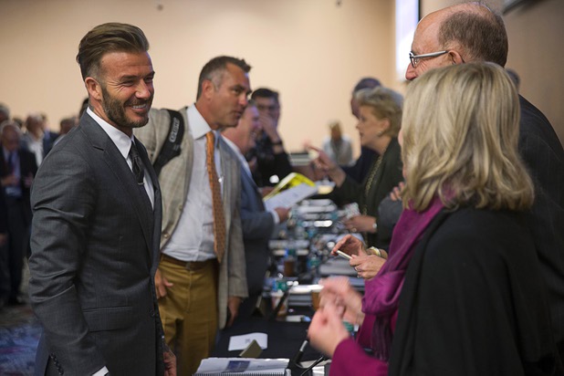 Soccer star David Beckham chats with committee members during a meeting of the Southern Nevada Tourism Infrastructure Committee at UNLV Thursday, April 28, 2016.