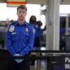 A Transportation Security Administration inspector works at a security checkpoint at Lambert-St. Louis International Airport on Tuesday, April 12, 2016, in St. Louis. 