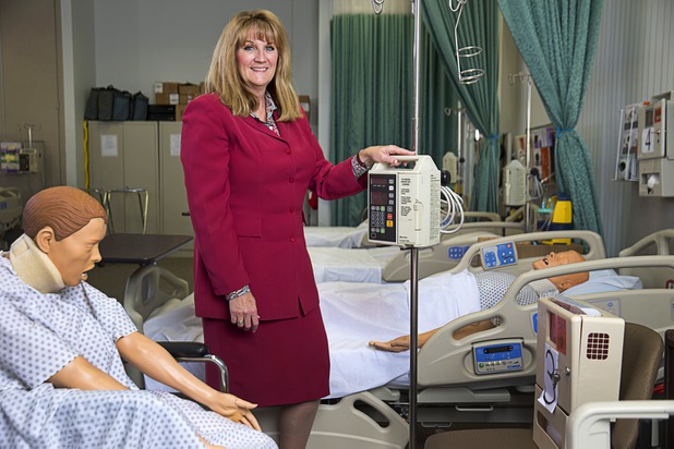 Renee Coffman, president and co-founder of Roseman University of Health Sciences, poses in a nursing lab Tuesday, May 3, 2016.