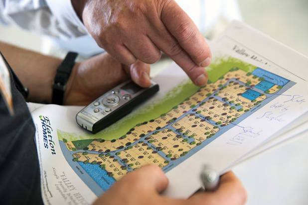 Ted Price, president of Elation Homes, points to a map of the Valley Heights by Elation Homes subdivision during an interview Wednesday, May 4, 2016, in Moapa Valley.