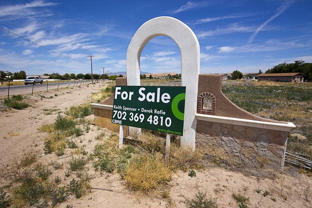 A sign advertises land for sale at Moapa Valley Boulevard and Whipple Avenue on Wednesday, May 4, 2016, in Moapa Valley.