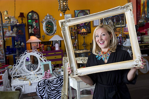 Natasha Pace of Silver Lining Estate Sales poses at Gypsy Bazaar, a friend's vintage resale shop, Thursday, May 5, 2016.