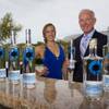 Angela Pettit and her father Danny Pettit pose with bottles of Azzurre Vodka Thursday, May 5, 2016. Azzurre Spirits, started in 2014, sells ultra-premium vodka and gin brand made with natural ingredients, such as apples, grapes and sugar cane.