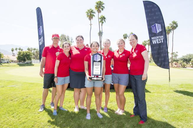 The UNLV women's golf team poses with its trophy after winning the 2016 Mountain West Championship.