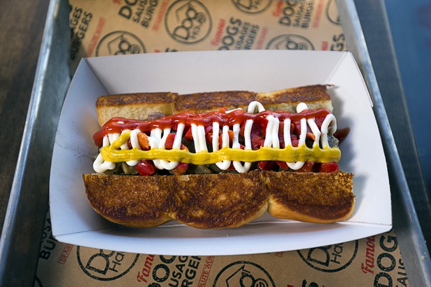 A "Downtown Dog" (smoked bacon wrapped dog, caramelized onions, roasted bell peppers, mayo, mustard, ketchup on a grilled Hawaiian roll) is displayed at the Dog Haus restaurant at 4480 S Paradise Rd. Monday, May 9, 2016. The California-based chain specializes in creative hot dogs, burgers, sausages & fries. The Las Vegas restaurant opened in March.