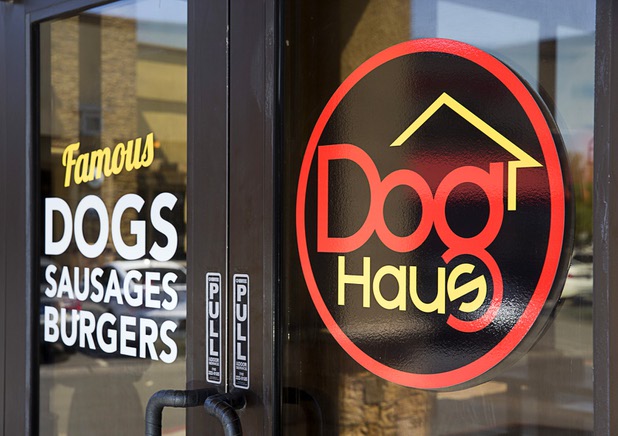 The Dog Haus logo is shown on the door to the restaurant at 4480 S Paradise Rd. Monday, May 9, 2016. The California-based chain specializes in creative hot dogs, burgers, sausages & fries. The Las Vegas restaurant opened in March.