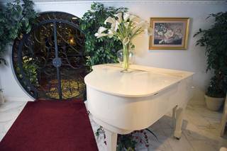 A view of a piano and decorative entryway at Plaza Royale Wedding Chapel on Sunday, May 8, 2016, in the Plaza in downtown Las Vegas. Owners Greg and Marina Welch relocated to the Plaza after many years of running a chapel in the Riviera.