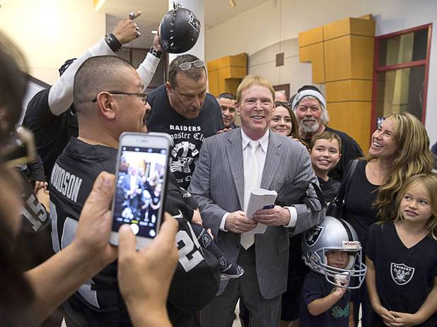 Oakland Raiders owner Mark Davis is greeted by local Raiders fans following a meeting of the Southern Nevada Tourism Infrastructure Committee at UNLV Thursday, April 28, 2016.
