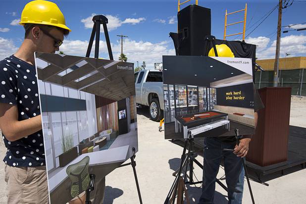 Artist illustrations are displayed during groundbreaking ceremony for Fremont9, a new apartment complex at East Fremont and Ninth streets, in downtown Las Vegas, Monday, May 16, 2016.