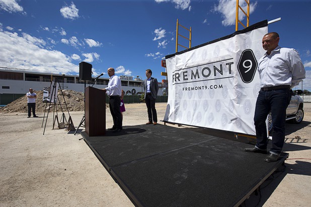 Todd Kessler left, of Resort Gaming Group, Nate Carlson, center, vice president of development for the Wolff Company, and Tim Wolff, executive vice president of development for the Wolff Company, speak during groundbreaking ceremony for Fremont9, a new apartment complex at East Fremont and Ninth streets, in downtown Las Vegas, Monday, May 16, 2016.