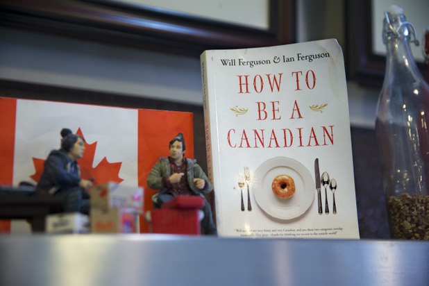 Canadian-themed books and decorations adorn a shelf at Salted Malted Bakery & Creamery, 6584 N. Decatur Blvd., Tuesday, May 17, 2016. The restaurant offers many Canadian specialties such as poutine, peameal bacon, and a variety of sweets.