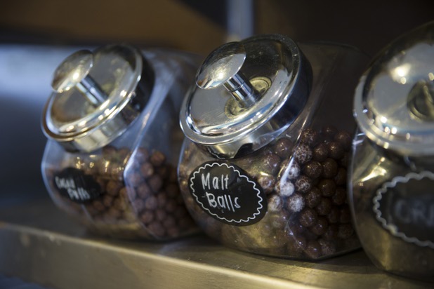 Malt balls are shown on a shelf at Salted Malted Bakery & Creamery, 6584 N. Decatur Blvd., Tuesday, May 17, 2016. The restaurant offers many Canadian specialties such as poutine, peameal bacon, and a variety of sweets.