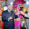 Bill Boyd, executive chairman for Boyd Gaming, right, hands former Las Vegas Mayor Oscar Goodman a limited edition gaming chip during a 60th anniversary celebration for the Fremont hotel-casino at 200 Fremont St. in Las Vegas on Wednesday, May 18, 2016.