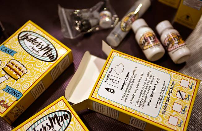 The Bakers Man packages E Liquids in a box to mix like a recipe for sale during the Vape Exhibit at the Sands Expo and Convention Center promoting a variety of new and interesting E-cigarette products on Saturday, May 21, 2016.