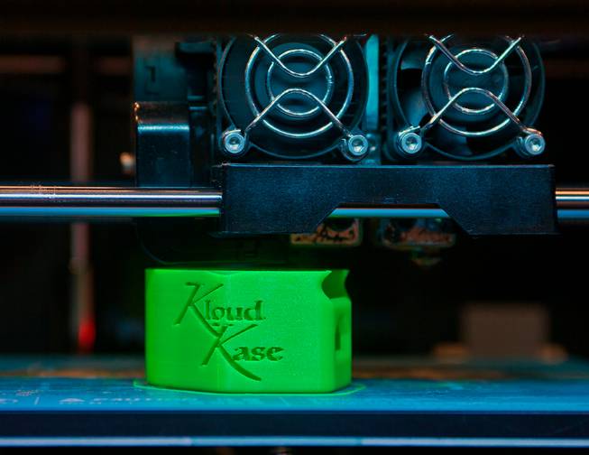 Another Kloud Kase is created in a 3D printer during the Vape Exhibit at the Sands Expo and Convention Center promoting a variety of new and interesting E-cigarette products on Saturday, May 21, 2016.