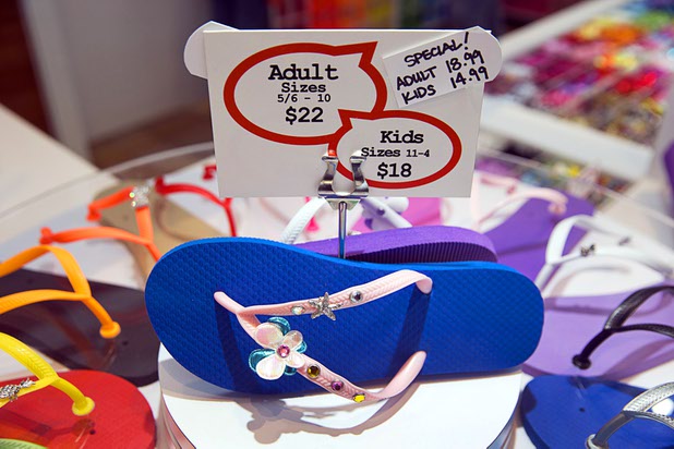Customized flip flops are displayed at the Flip Flop Workshop kiosk in the Fashion Show mall Monday, May 23, 2016. The company allows you to decorate your flip-flops, then watch a "flip-flop genius" put it together in front of you.