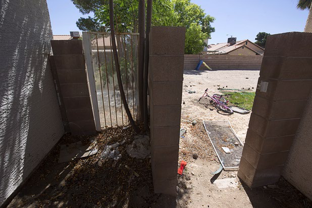 A view of homes that had been occupied by squatters in North Las Vegas Wednesday, May 18, 2016.