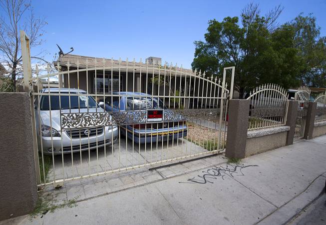 A view of a home in North Las Vegas Wednesday, May 18, 2016. The former owners were arrested for squatting in a Las Vegas home earlier this year.