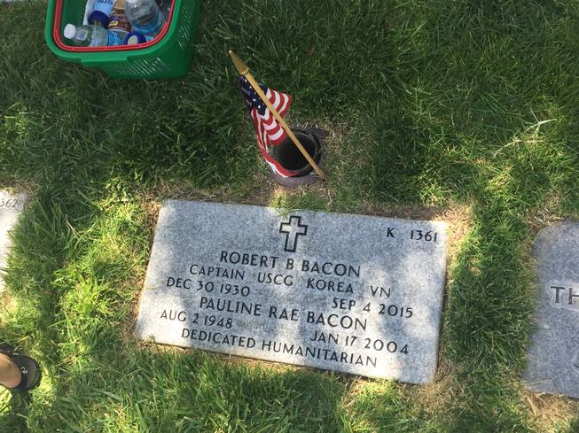 The grave marker of Robert Bacon, a Korean War veteran who died in 2015, and Pauline Bacon, a “dedicated humanitarian," is pictured Monday, May 30, 2016 at the Southern Nevada Veterans Memorial Cemetery.