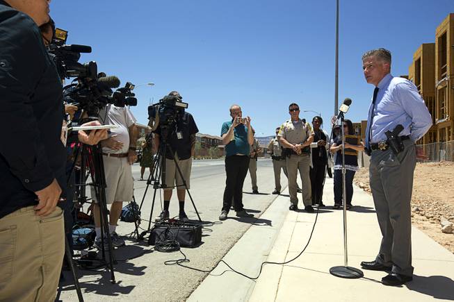 Metro Police Lt. Dan McGrath, of the LVMPD homicide section, speaks during a news conference by an apartment complex under construction at Jerry Tarkanian Way and Hacienda Avenue Wednesday, June 1, 2016. Security guard Mark Santee was shot and killed at the site in April.