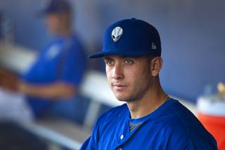 Las Vegas 51s third baseman T.J. Rivera looks out from the dugout before a game against the Reno Aces at Cashman Field Monday, June 13, 2016.
