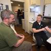 Patient Geoff Post, left, gets a check-up with David Livingston LPN (licensed practical nurse) in a Medicine on the Move mobile clinic exam room at the Las Vegas Rescue Mission Wednesday, June 15, 2016. The clinic is from Southwest Medical, part of OptumCare, in partnership with Health Plan of Nevada and Sierra Health and Life.