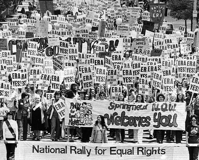 Thousands march in Springfield, Ill., on May 16, 1976, to support the passage of the Equal Rights Amendment. Six years later, the amendment's June 30 deadline passed without ratification. Only 35 states, three short of those necessary, endorsed it.