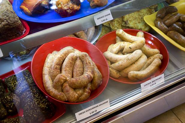 Homemade Hungarian sausage, left, and chicken bratwurst is displayed at Tina's Gourmet Sausage House, 2101 S Decatur Blvd., Thursday, June 16, 2016.