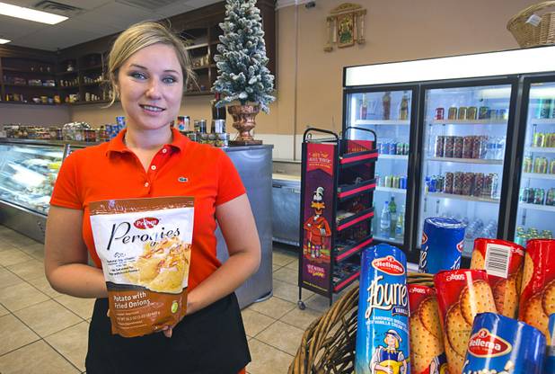 Zoya Medov poses with a package of frozen perogies at Tina's Gourmet Sausage House, 2101 S Decatur Blvd., Thursday, June 16, 2016.