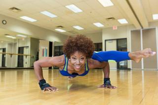 Pediatrician Trina Wiggins, 55, practices a leg-over-arm pushup in preparation for a Ms. Fitness competition while training at her local YMCA in Las Vegas June 24, 2016.