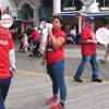 A picketer uses a bullhorn to urge people not to cross picket lines Sunday, July 3, 2016, during a strike against the Trump Taj Mahal casino in Atlantic City, N.J. The strike by Local 54 of the Unite-HERE union was in its third day with no new talks scheduled.