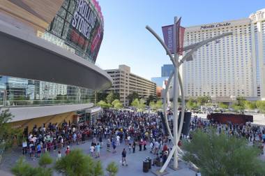 Thousands of people wait outside the T-Mobile Arena half an hour before the start of the USA Basketball exhibition game against Argentina Friday, July 22, 2016, in Las Vegas. 