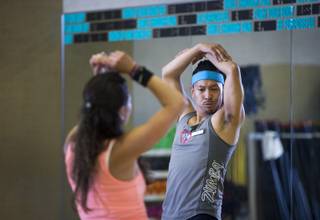 Chiropractor Teddy Sim, right, teaches a Zumba class at Lifetime Fitness, 121 Carnegie St., in Henderson, Sunday, July 3, 2016.