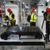 A Tesla battery pack is displayed during a media tour of the new Tesla Gigafactory Tuesday, July 26, 2016, in Sparks. It's Tesla Motors' biggest bet yet: a massive, $5 billion factory in the Nevada desert that could almost double the world's production of lithium-ion batteries by 2018. 