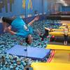 A patron flips July 31, 2013, at a trampoline park in Orem, Utah. Trampoline park injuries have soared as the indoor jumping trend has spread. That's according to a study published Monday, Aug. 1, 2016, that shows annual U.S. emergency room visits jumped 12-fold for park-related injuries from 2010 through 2014.