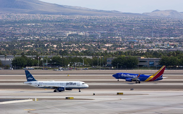 A Jet Blue passenger jet taxis to a runway at McCarran International Airport Tuesday, August 2, 2016.