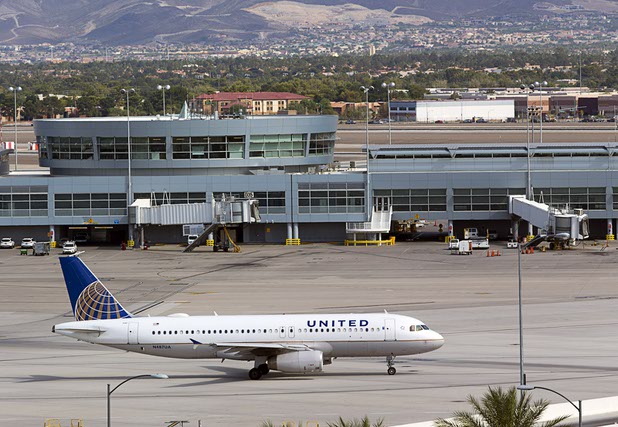 A United passenger jet taxis to a runway at McCarran International Airport Tuesday, August 2, 2016.