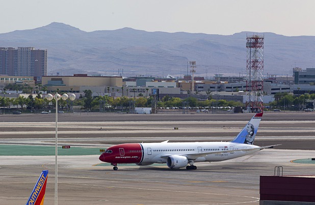 A Norwegian passenger jet heads to a gate after landing at McCarran International Airport Tuesday, August 2, 2016.