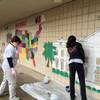 Employees of Brownstein Hyatt Farber Schreck participated in a clean-up day at Halle Hewetson Elementary School, the school they’ve adopted for the academic year.