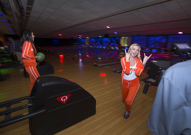 Hooters Girl Kristin Morris celebrates during a charity bowling event to support the Nevada Society for the Prevention of Cruelty to Animals (NSPCA) at the Sam's Town Bowling Center Sunday, August 7, 2016. Hooters funneling all of its advertisement money for August into helping a variety of charitable causes.