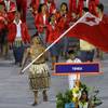 Pita Nikolas Aufatofua carries the flag of Tonga during the opening ceremony for the 2016 Summer Olympics in Rio de Janeiro, Brazil, Friday, Aug. 5, 2016. 