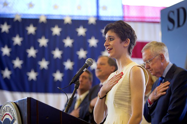 Naree Asherian, a Palo Verde High School student, sings the national anthem during an opening ceremony for the Federal Justice Tower, a new office building in downtown Las Vegas, Thursday, Aug. 18, 2016. The building will provide office space for multiple components of U.S. Immigration and Customs Enforcement, the U.S. Attorneys Office for the District of Nevada, the Federal Protective Service and the Department of Labors Office of the Inspector General.
