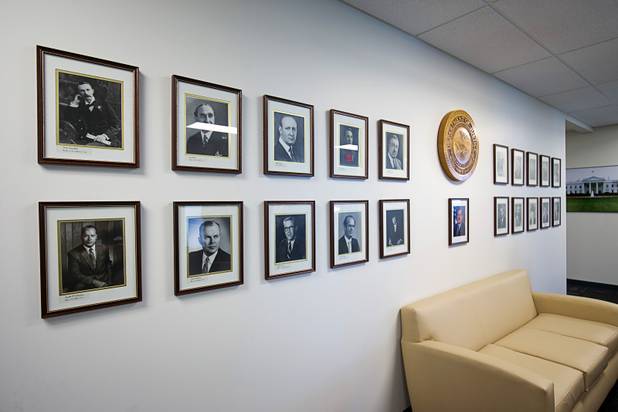 Photos of former Nevada attorney generals are displayed in the Federal Justice Tower, a new office building in downtown Las Vegas, Thursday, Aug. 18, 2016. The building will provide office space for multiple components of U.S. Immigration and Customs Enforcement, the U.S. Attorneys Office for the District of Nevada, the Federal Protective Service and the Department of Labors Office of the Inspector General.