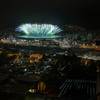 Fireworks explode above the Maracana stadium Sunday, Aug. 21, 2016, during the closing ceremony for the Summer Olympics, seen from the Mangueira slum in Rio de Janeiro, Brazil.