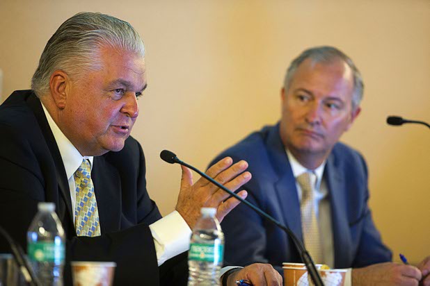 Clark County Commission Chairman Steve Sisolak, left, asks a question as committee chairman Steve Hill,  executive director of the Governor's Office of Economic Development, looks on during a Southern Nevada Tourism Infrastructure Committee meeting at UNLV Thursday, Aug. 25, 2016.
