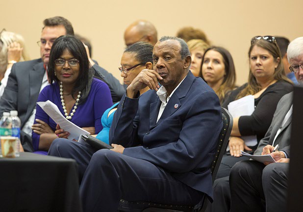 State Assemblyman Harvey Munford, center, listens during a Southern Nevada Tourism Infrastructure Committee meeting at UNLV Thursday, Aug. 25, 2016.