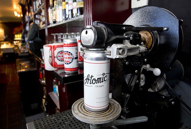 An Atomic-themed beer "crowler" is shown on a canning machine at Atomic Liquors, 917 Fremont St., in downtown Las Vegas Sunday, Aug. 28, 2016.