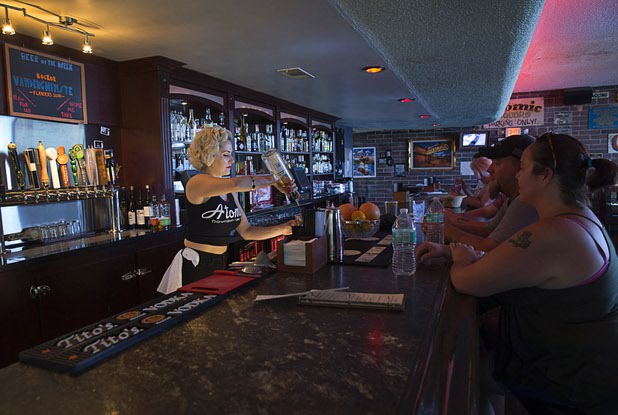 Bartender Carrie Wilds creates a cocktail at Atomic Liquors, 917 Fremont St., in downtown Las Vegas Sunday, Aug. 28, 2016.